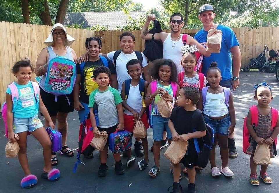 Catherine Gutierrez (back row, far left) has found this mission particularly important, knowing what it’s like to fall short on supplies on the first day of school.